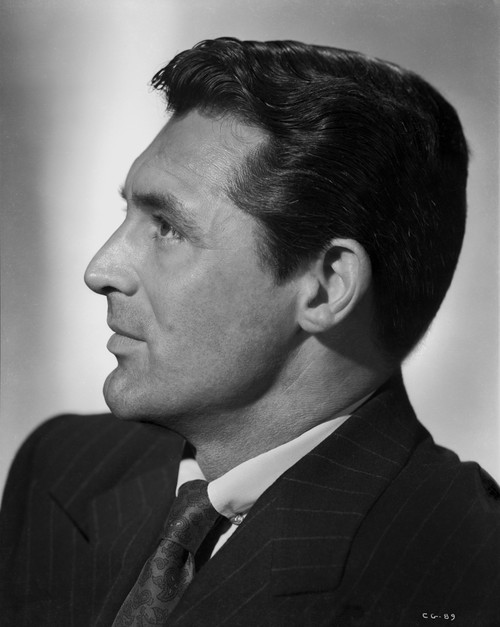 Cary Grant Side view Pose in Suit and Printed Silk Necktie Photo Print - Item # VARCEL695950