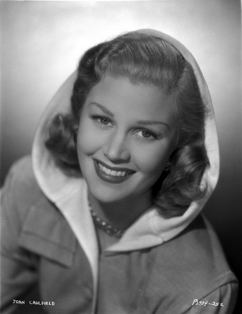 Joan Caulfield wearing a Coat in a Classic Portrait Photo Print - Item # VARCEL695988