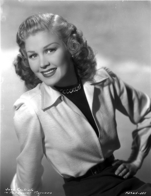 Joan Caulfield wearing a White Shirtdress in a Classic Portrait Photo Print - Item # VARCEL696016
