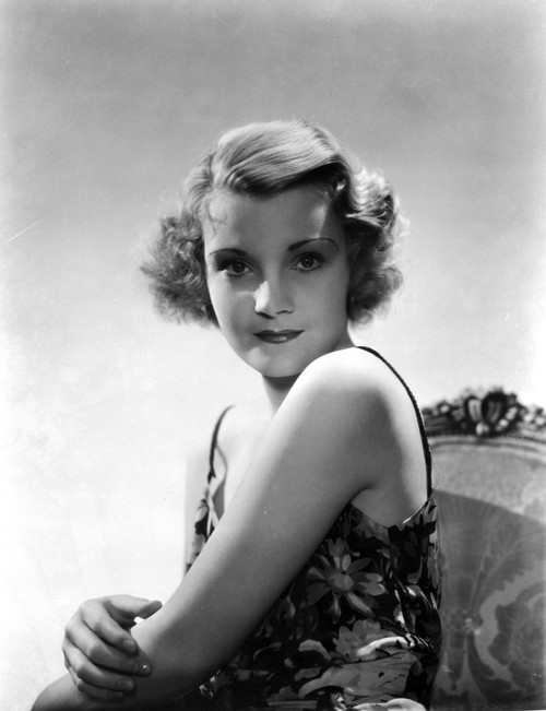 Helen Chandler sitting and wearing a Sleeveless Dress Photo Print - Item # VARCEL696037
