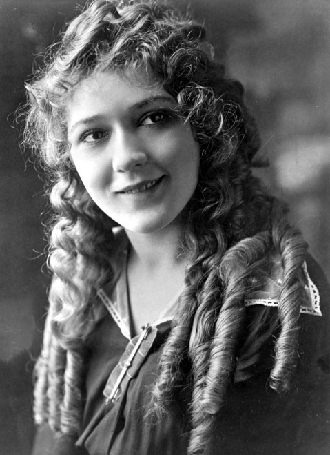 Mary Pickford on a Curling Hair Photo Print - Item # VARCEL703085