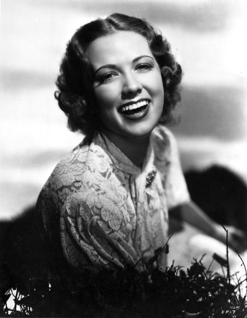 Eleanor Powell on an Embroidered Dress and laughing Photo Print - Item # VARCEL703183