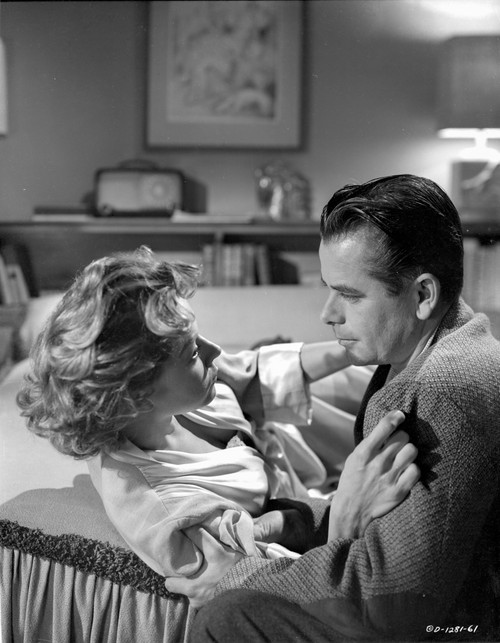 Human Desire Woman Lying on Bed with Man Photo Print - Item # VARCEL703222