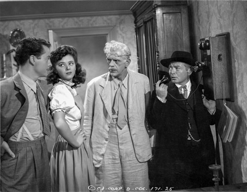 Boogie Man Will Get You Three Men and a Woman Discussing Scene Excerpt from Film Photo Print - Item # VARCEL703208