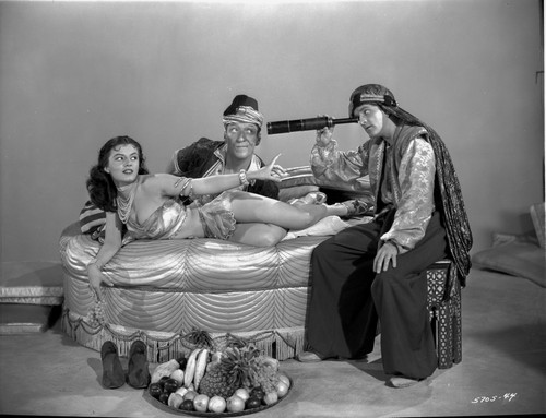 Looking For Danger Lady Lying on Bed with Two Men Photo Print - Item # VARCEL703295