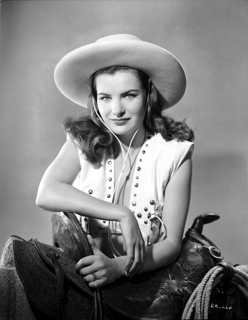 Ella Raines smiling in Cowgirl Attire Photo Print - Item # VARCEL703411