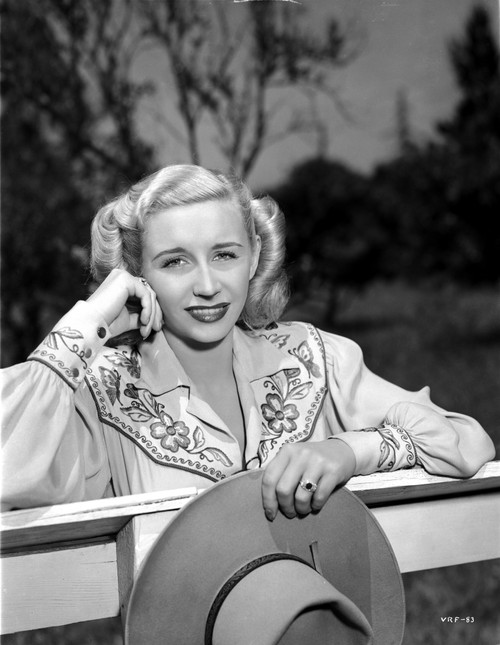 Vera Ralston on an Embroidered Long Sleeve and smiling Photo Print - Item # VARCEL703441