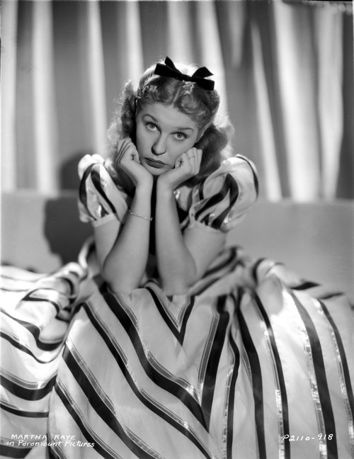 Martha Raye on a Printed Gown and sitting Photo Print - Item # VARCEL703517