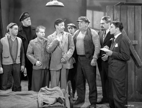Smuggler's Cove Group of People Having a Discussion in a Movie Scene Photo Print - Item # VARCEL703522
