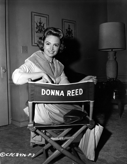 Donna Reed on an Actor Chair Photo Print - Item # VARCEL703546