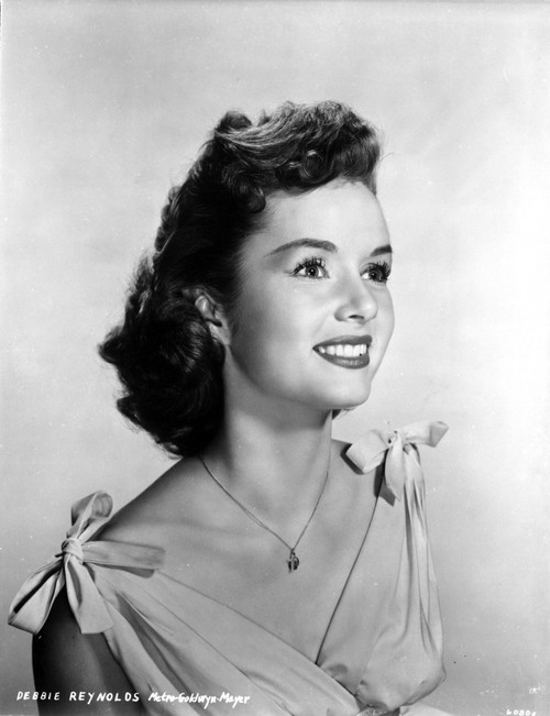 Debbie Reynolds smiling in a White Dress with a Ribbon Shoulder Photo Print - Item # VARCEL703588