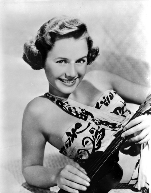A Portrait Of Debbie Reynolds Carrying A Ukulele Photo Print - Item # VARCEL703598