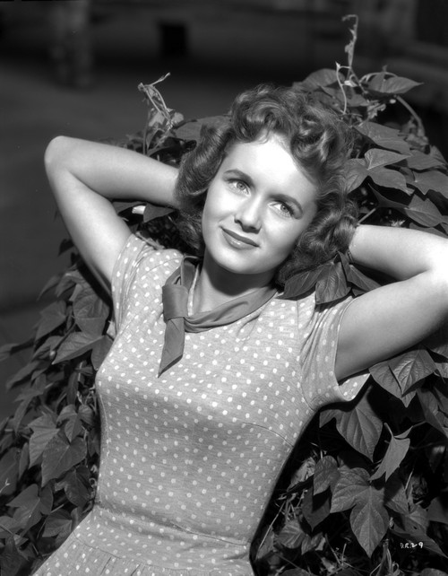 Debbie Reynolds on a Polka Dotted Dress and Leaning Photo Print - Item # VARCEL703604