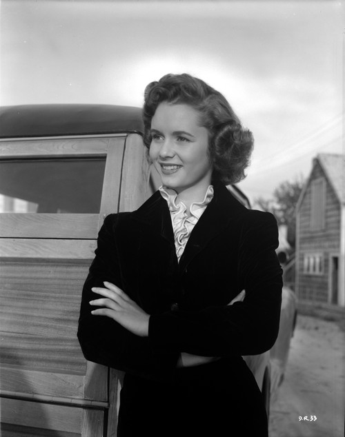 Debbie Reynolds on a Blazer and smiling Photo Print - Item # VARCEL703608