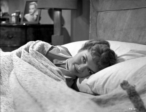 Debbie Reynolds Lying on a Bed Portrait Photo Print - Item # VARCEL703643