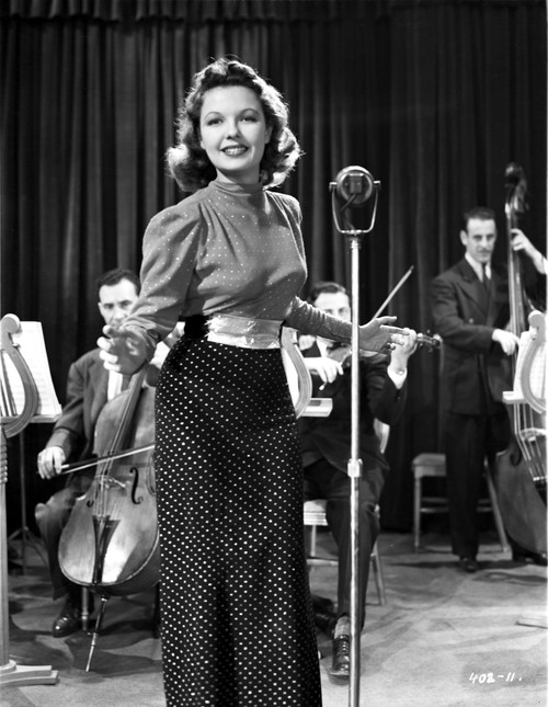 Marjorie Reynolds with a Microphone and Crowd Photo Print - Item # VARCEL703675