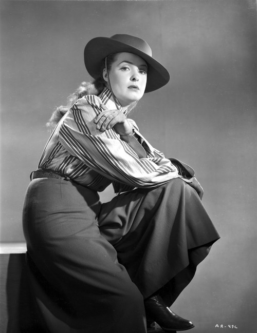 Ann Richards sitting and wearing Black Long Skirt in Classic Photo Print - Item # VARCEL703736