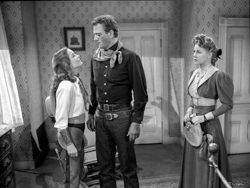 A scene from Tall In The Saddle Photo Print - Item # VARCEL703818
