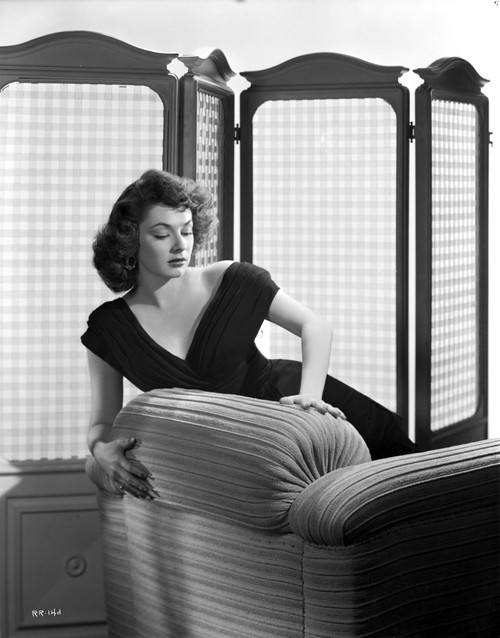 Ruth Roman Posed on Couch wearing Black Gown Photo Print - Item # VARCEL703904