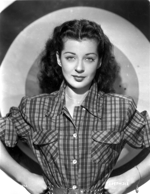 Gail Russell Posed in Checkered Shirt with Target Background Photo Print - Item # VARCEL703980