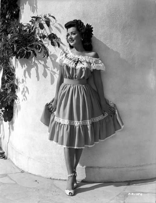 Ann Rutherford Leaning on the Wall while Holding Her Skit Photo Print - Item # VARCEL704092