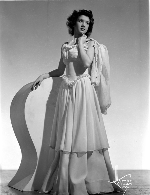 Peggy Ryan Posed wearing White Elegant Gown Photo Print - Item # VARCEL704112
