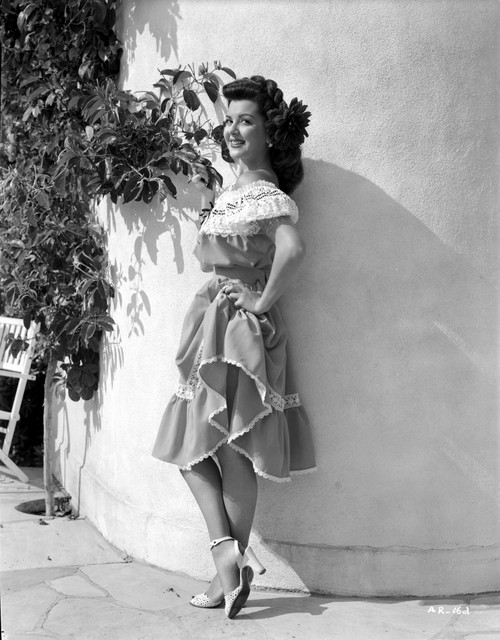 Ann Rutherford Leaning on the Wall wearing a Dress Photo Print - Item # VARCEL704086