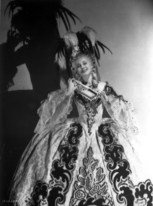 Norma Shearer standing in Ball Gown Photo Print - Item # VARCEL704335