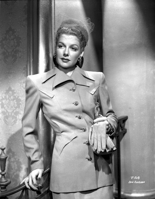 Ann Sheridan Leaning on the Chair, wearing a Coat Dress Photo Print - Item # VARCEL704397