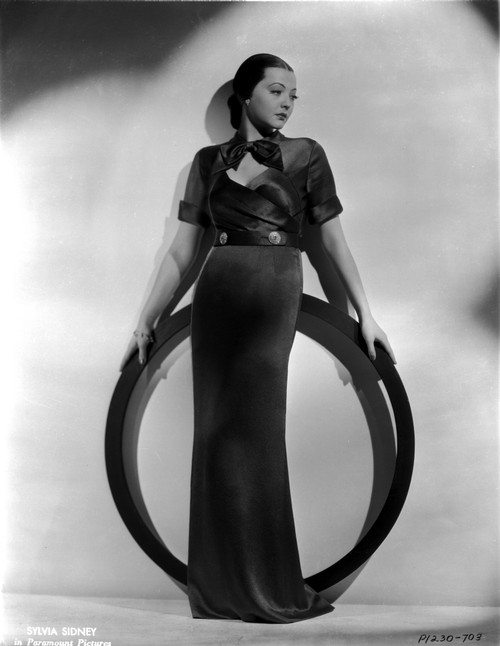 Sylvia Sidney standing and Holding a Ring in a Long Gown Photo Print - Item # VARCEL704485