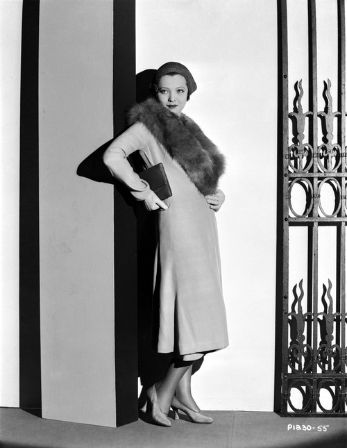 Sylvia Sidney Leaning on Wall in a Furry Scarf Photo Print - Item # VARCEL704473