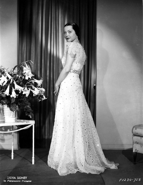 Sylvia Sidney wearing a Beaded White Gown Photo Print - Item # VARCEL704503