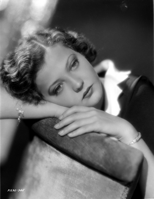 Sylvia Sidney Lying in a Black and White Blouse Photo Print - Item # VARCEL704479