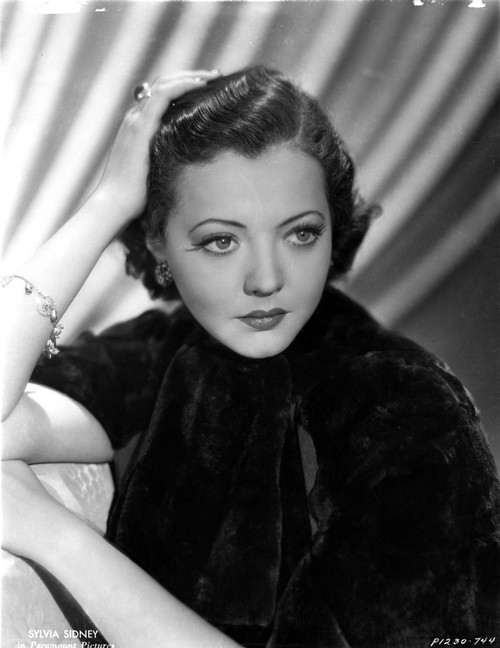 Sylvia Sidney in a Black Blouse with Ring and Bracelet Photo Print - Item # VARCEL704491