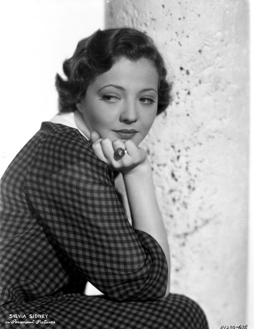 Sylvia Sidney sitting and Leaning Face on Hand in Printed Dress Photo Print - Item # VARCEL704507