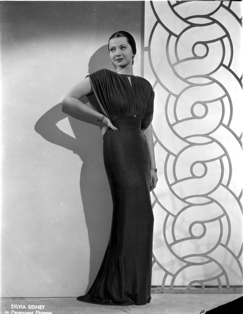 Sylvia Sidney wearing an Evening Gown and Hand on Waist Photo Print - Item # VARCEL704550