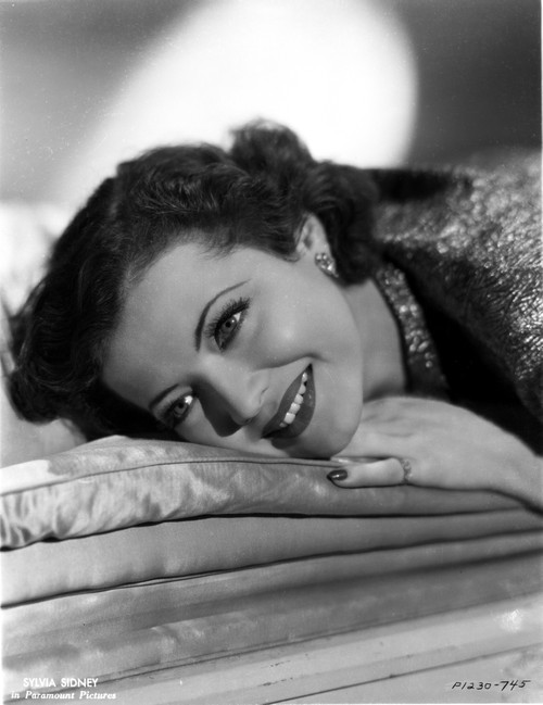 Sylvia Sidney Lying and smiling Photo Print - Item # VARCEL704539