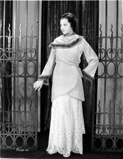 Sylvia Sidney wearing a Coat and White Gown Under Photo Print - Item # VARCEL704552