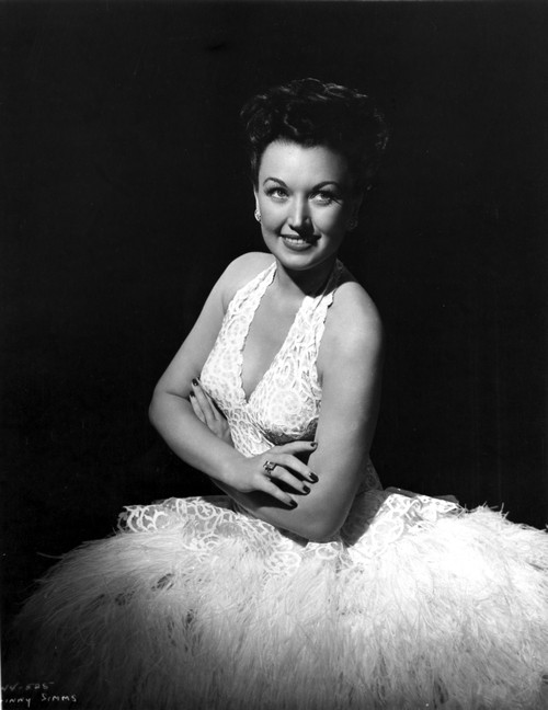 Ginny Simms smiling with White Gown Photo Print - Item # VARCEL704642