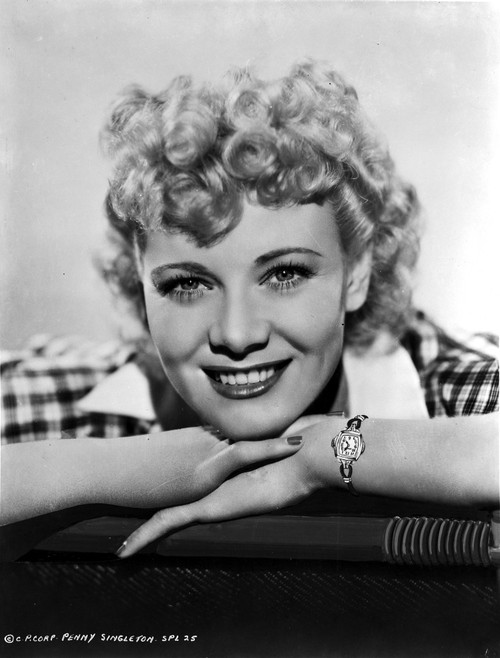 Penny Singleton smiling in Checkered Polo Close Up Portrait with White Background Photo Print - Item # VARCEL704636
