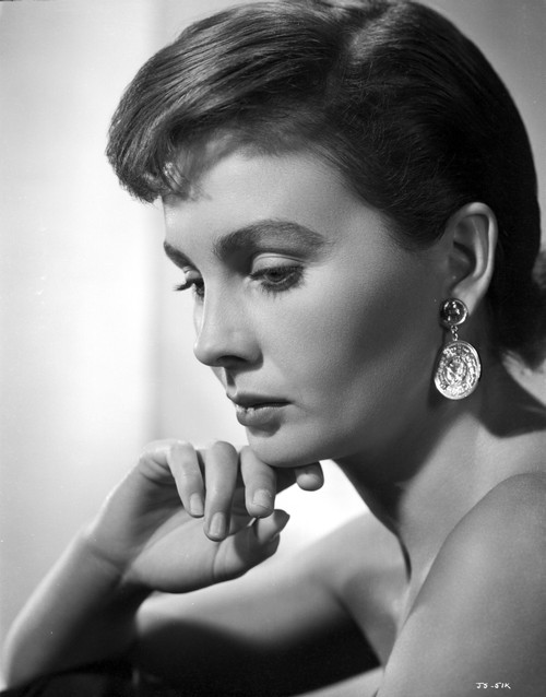 Jean Simmons Close Up Portrait in Shoulder Dress and Coin Earrings with Chin Leaning on the Right Hand Photo Print - Item # VARCEL704672