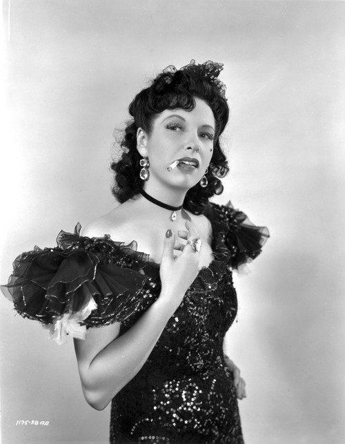 Gale Sondergaard Smoking a Cigarette Photo Print - Item # VARCEL704801