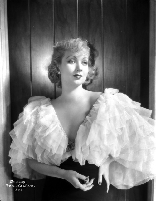 Ann Sothern wearing a Big Cap Sleeve Dress Photo Print - Item # VARCEL704823