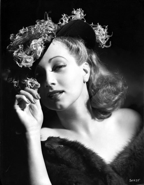 Ann Sothern wearing a Hat and A Furry Dress Photo Print - Item # VARCEL704826