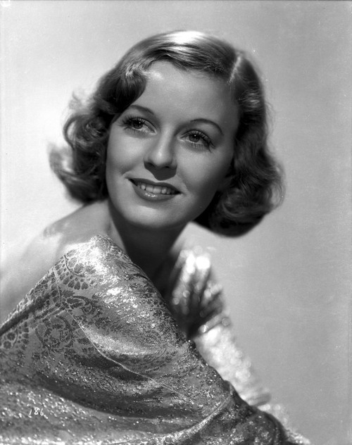 Margaret Sullivan Posed in Glossy Dress with a Smile Photo Print - Item # VARCEL704912