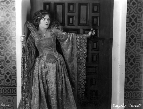 Blanch Sweet Leaning on Door wearing Elegant Gown Portrait Photo Print - Item # VARCEL704946