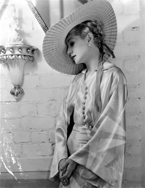 Lilyan Tashman Leaning on Dress with Hat Photo Print - Item # VARCEL705012