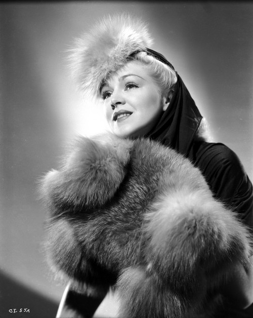 Claire Trevor Looking up in Fur Dress with a Little Smile Photo Print - Item # VARCEL705200