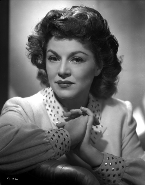 Claire Trevor Posed in White Dress with Black and White Background Photo Print - Item # VARCEL705222