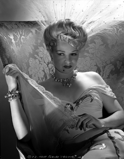 Claire Trevor sitting in White Dress Portrait Photo Print - Item # VARCEL705220